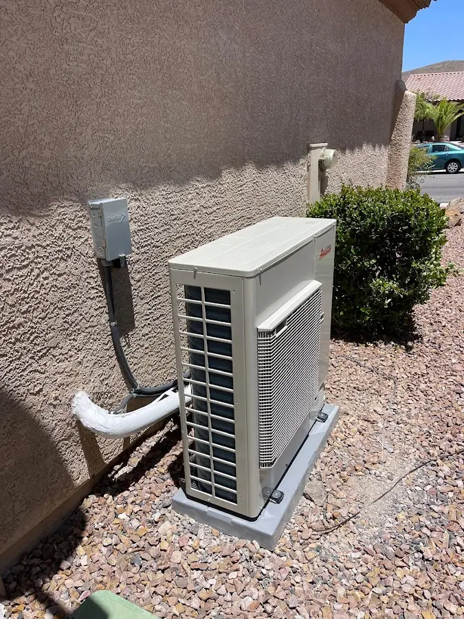 Residential air conditioning condenser unit in Byram